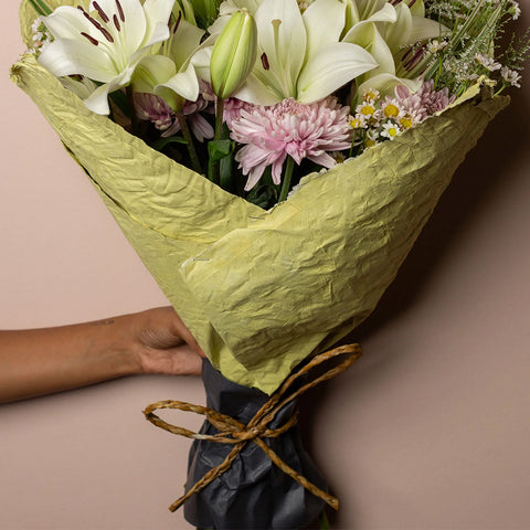 Recycled paper wrapping and tissue liner